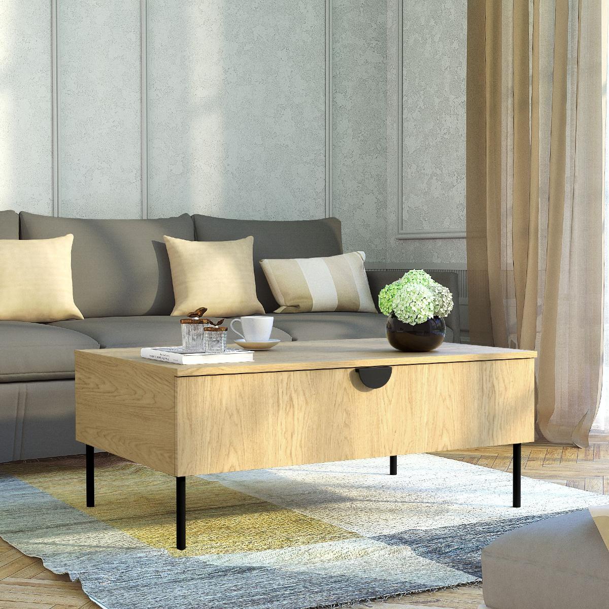 Table basse en bois clair avec tiroir et pieds métalliques noirs style scandinave